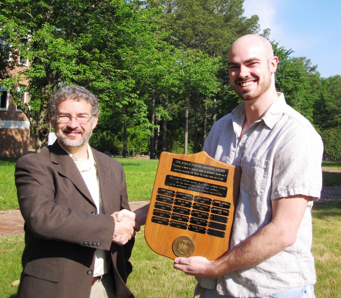 Christopher Triola was one of the recipients of the 2011 Rolf G. Winter Teaching Award. Physics Chair, Dr. Armstrong presented the award.