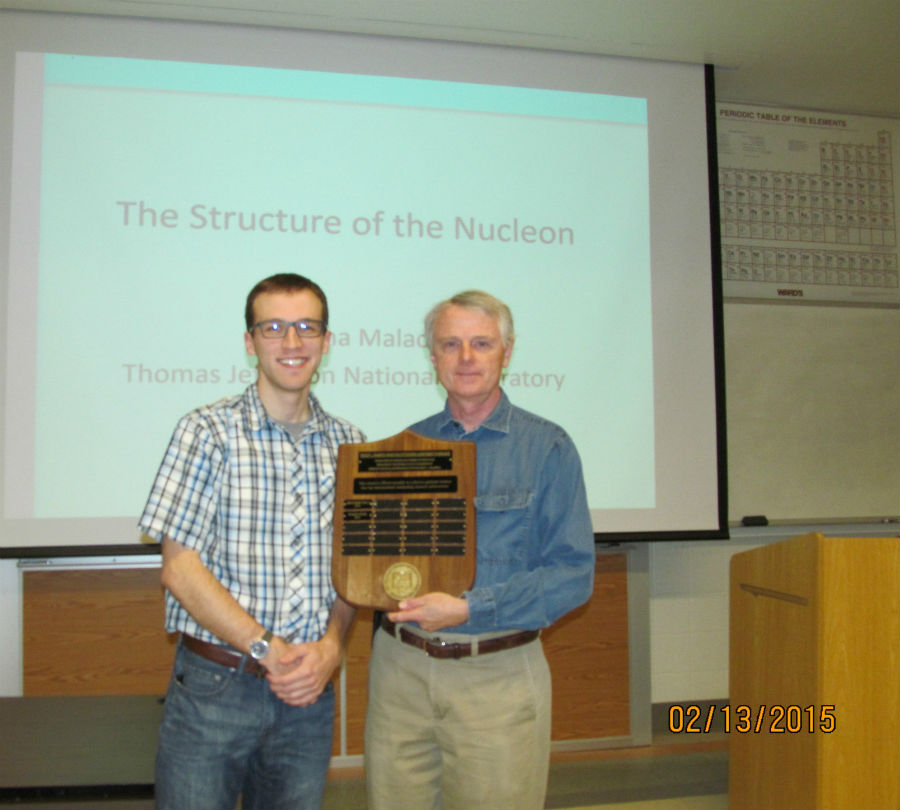 2014 The Rolf G. Winter Teaching Awardee Kurtis Batlett with Physics Chair Dr. Tracy