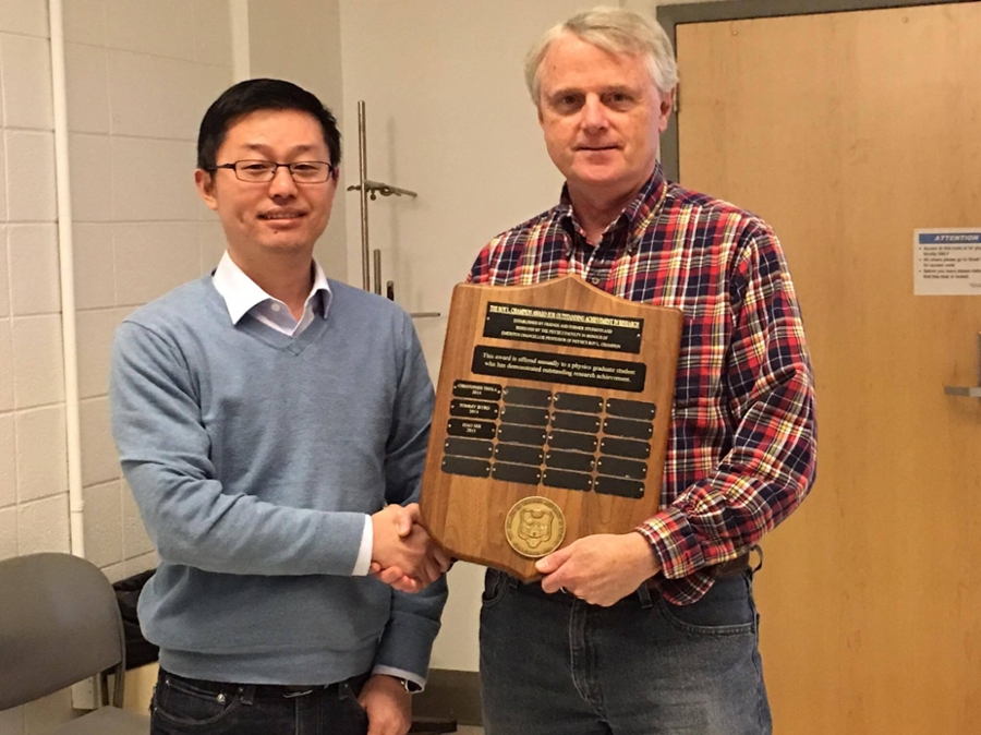 2015 The Roy L. Champion Awardee Hao Shi with Physics Chair Dr. Tracy