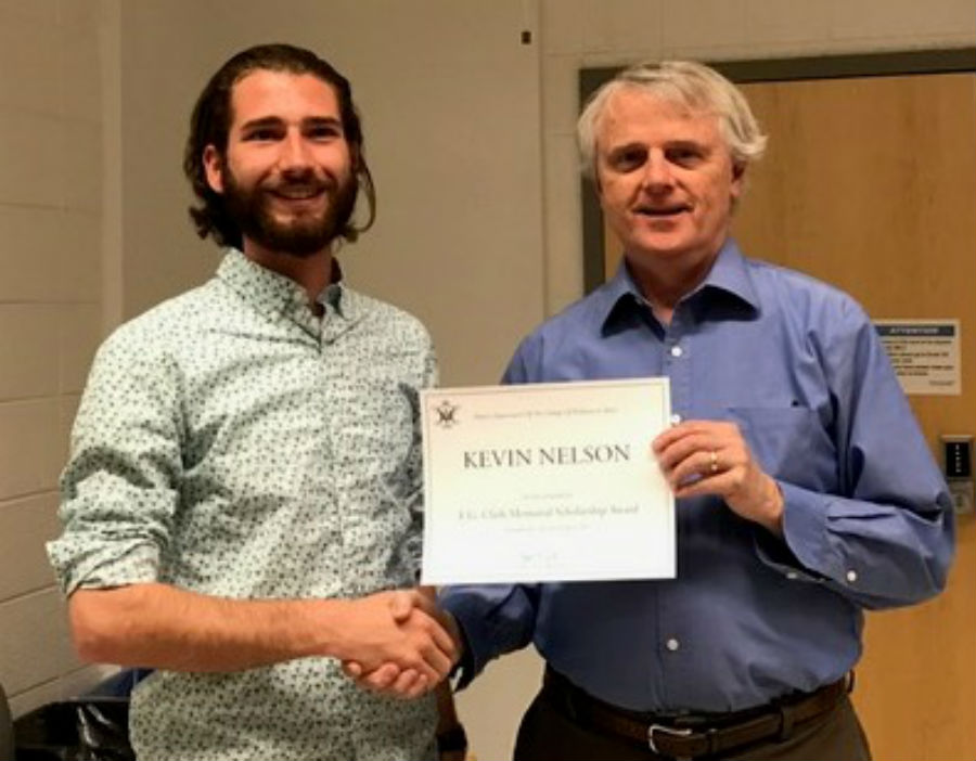 2017 E. Gary Clark Scholarship awardee Kevin Nelson with physics chair Dr. Tracy