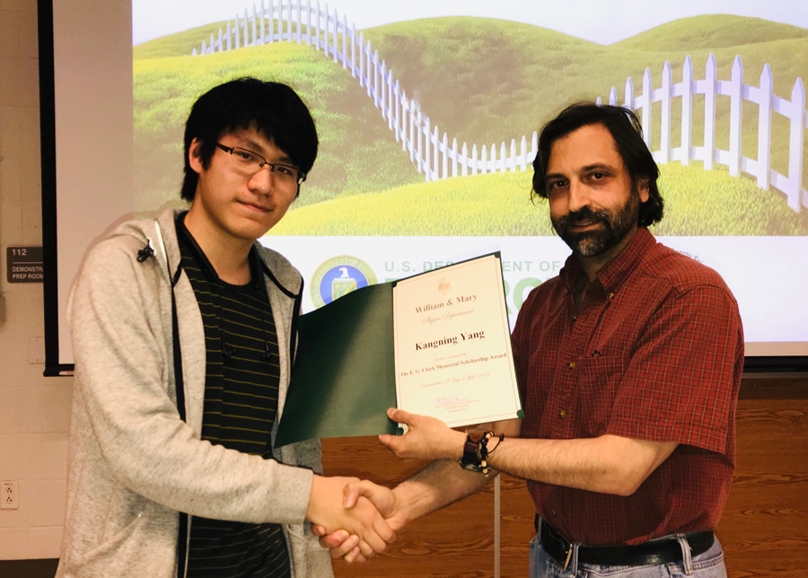 2019 E. Gary Clark Scholarship awardee Kangning Yang with physics chair Prof. Carone