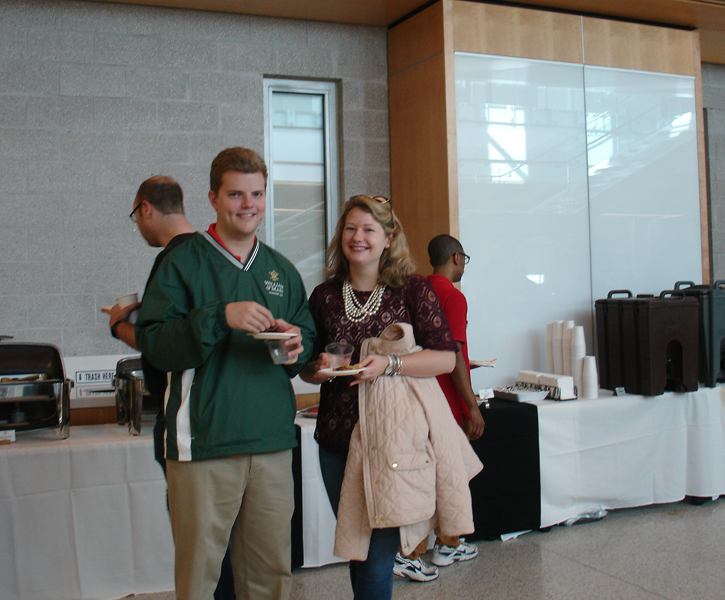 Abby Smith (Class of 2017) enjoys some refreshments with her guest during the Homecoming Open House