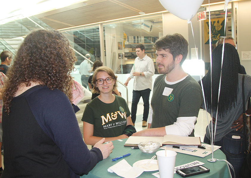 Professor Porter greets returning alumni Ross & Meghan (both Class of 2013)