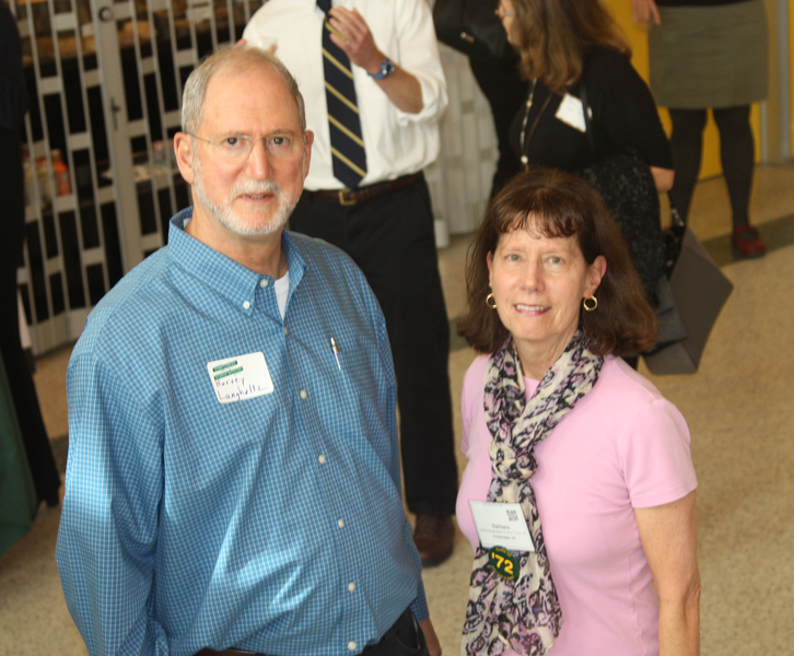 Dr. Barbara Keller (BA, Class of 1972; MA, 1973; MA, 1975) and Professor Langholtz share a conversation at the homecoming reception for psych majors.