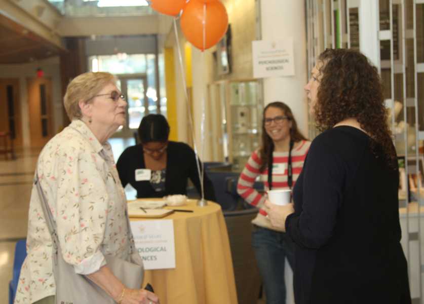 Linda Lester Hagen (Class of 1962) shares a conversation with Professor Porter during registration