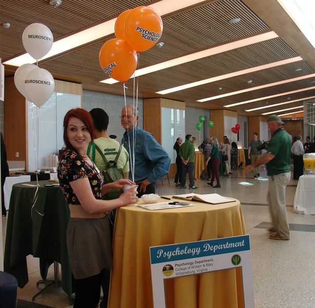 Molly Penrod prepares to greet and register returning alumni