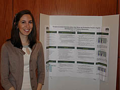 Engin Ege with her poster on at-risk adolescents
