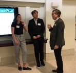 Undergraduates from the Schroeder Center for Health Policy present their semester research projects at the board’s evening reception.