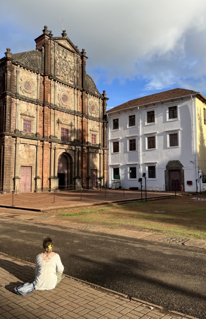 Student looking at temple during study abroad.