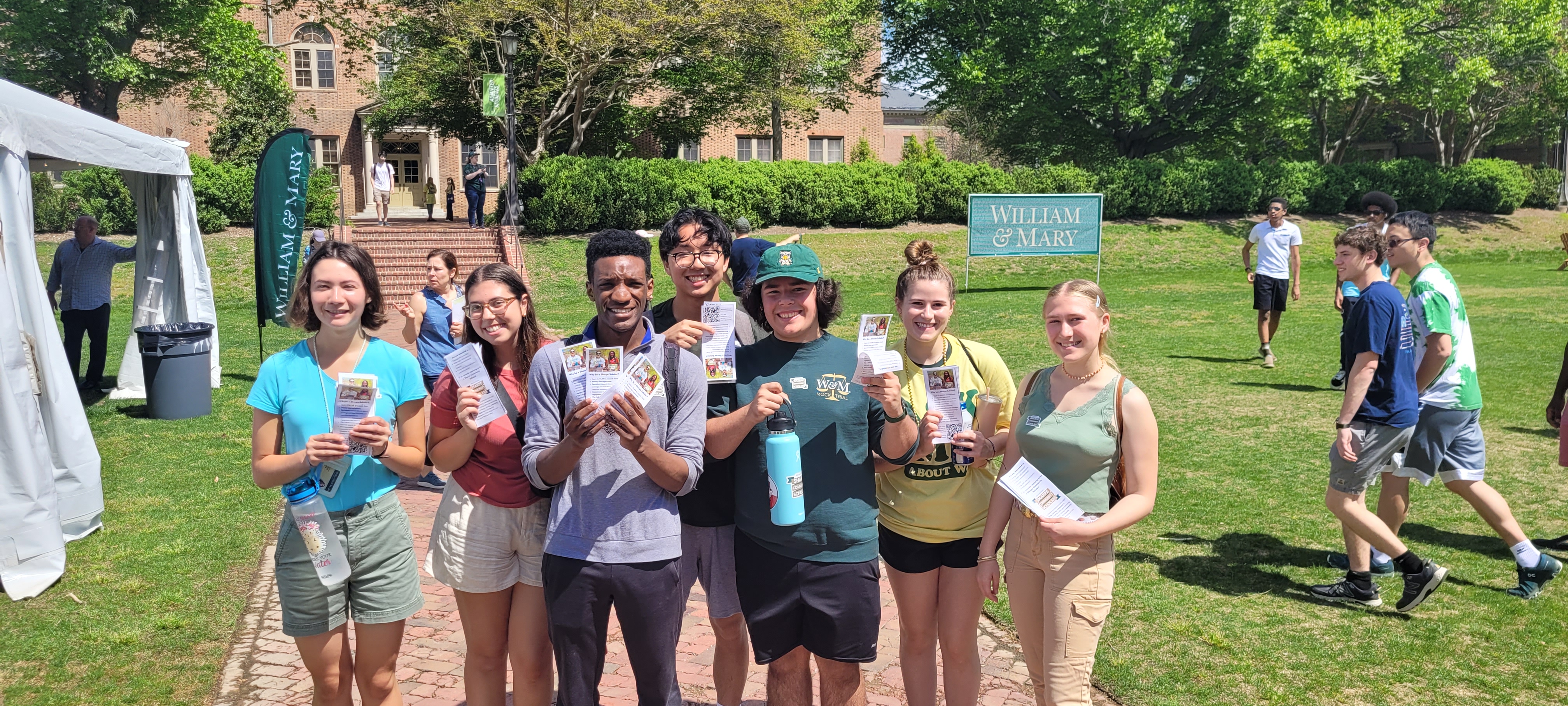 Sharpe Scholars and Program Fellows with Sharpe promotional materials at Day for Admitted Students