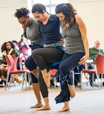 Dancers Olivia Armstrong '14, Kayla Moore '13, and Arisa Smith '17 perform at the Lemon Project symposium.