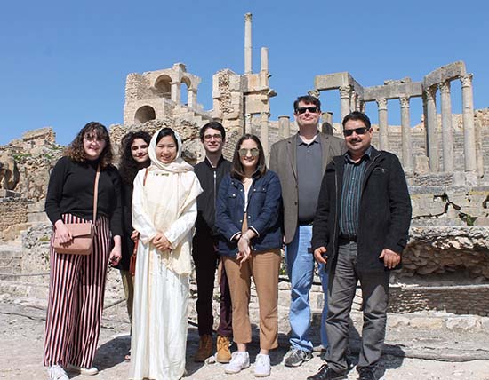 Professor Burns and students at the Roman ruins at Dougga, with their guide and translator Tarek.