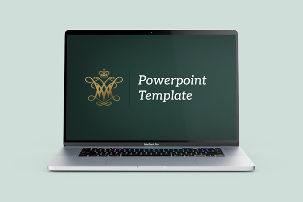 A laptop with the text Powerpoint Template displayed on the screen