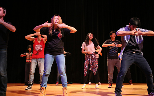 A group of students performing a dance