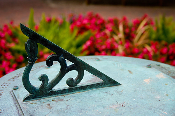 Sundial and campus flowers