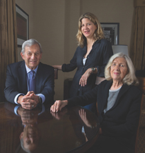 Oncologist Vince DeVita Jr. '57, D.Sc. '82 (left) with wife Mary Kay Bush DeVita '57 (right) and their daughter, Elizabeth DeVita Raeburn (Photo by Don Hammerman)