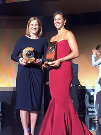 Jill Ellis '88 (left) poses for a photo alongside Carli Lloyd, who was named FIFA World Player of the Year