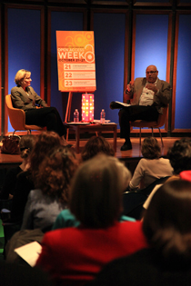 Karin Wulf, director of the Omohundro Institute for Early American History and Culture, and Dennis Manos, vice provost for Research and Graduate Professional Studies, discuss open access publishing at Swem Library during Open Access Week in October 2013.