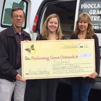 Jim Crouse (L) and Melanie King (R) of Proclaiming Grace Outreach flank W&M Dining Services marketing manager Melissa Strain.