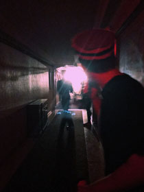A bellhop leads a tour group through the haunted hotel. (Photo by Kristen Popham '20)