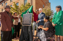 The plaque for Hardy Hall is revealed at an October 2016 event. (Photo by Skip Rowland '83)