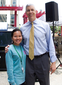 Phan with former U.S. Secretary of Education Arne Duncan during her internship with the Department of Education (courtesy photo)