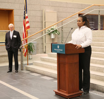 Student Assembly President Eboni Brown '17 speaks to the students, alumni and legislators gathered at the reception. (Photo by Stephen Salpukas)