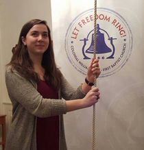 Webb rings the bell at Williamsburg's First Baptist Church as part of its "Let Freedom Ring" 240th anniversary celebration.