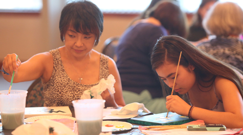 A family enjoys one of the weekend's offerings. (Photo by Stephen Salpukas)