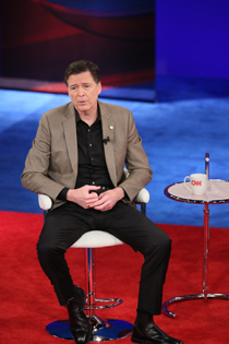 Comey answers questions from the audience during the town hall. (Photo by Stephen Salpukas)