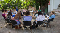 Trip participants met with representatives from a Cuban government agency in Havana. (Photo by Rachel Sims)
