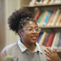 A student joins in the discussion with journalist Jodi Kantor in Intro to Gender, Sexuality and Women's Studies. (Photo by Stephen Salpukas)