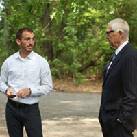 Coach Graham Ludmer chats with President Taylor Reveley.