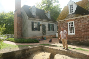 Mark Kostro, senior staff archaeologist for the Colonial Williamsburg Foundation and adjunct professor for the Archaeological Field School, looks down over the site.