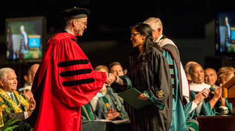 Halleran presents the Thomas Jefferson Prize in Natural Philosophy to Likhitha Kolla '18 during the 2018 Charter Day ceremony. (Photo by Skip Rowland '83)