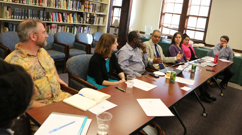 Members of the Task Force on Race and Race Relations engage in discussion during a meeting in 2015. (Photo by Stephen Salpukas)