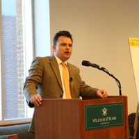 Co-moderator Drew Stelljes talks with attendees. (Photo by Collin Ginsburg)