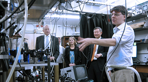 Physicist Seth Aubin gives members of the Board of Visitors a tour of Small Hall in 2011. (Photo by Joseph McClain)