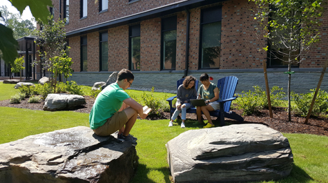 Students take advantage of the compassion garden. (Photo by Jessica Raymond)