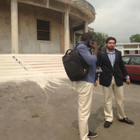 Harsh Desai (background) and Ousseynou Ngom of AidData partner Development Gateway. Photo by Kathy Nolan