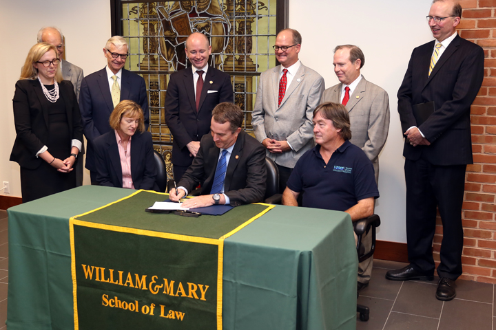 Gov. Northam signs HB 345 at Law School