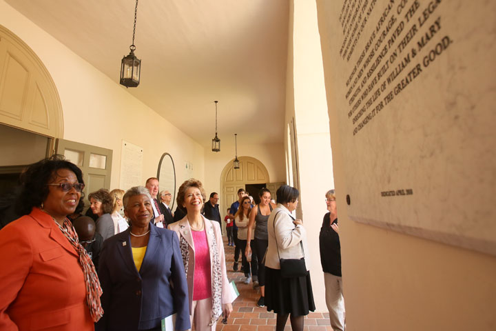 Ely, Briley and Strafer look at the plaque that bears their names. (Photo by Stephen Salpukas)