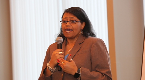 Chief Diversity Officer Chon Glover speaks at the forum. (Photo by Stephen Salpukas)