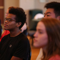 Attendees listen to the presentation. (Photo by Stephen Salpukas)