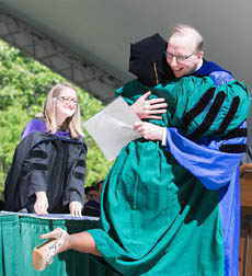 One of many happy moments from commencement exercises at the Martha Wren Briggs Amphitheatre at Lake Matoaka, May 14, 2017. (Photo by Odd Moxie)