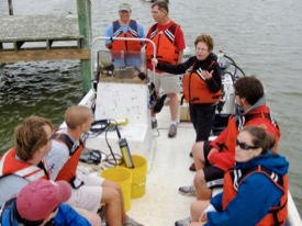 Iris Anderson (center) explains the workings of a CTD to members of the 2008 matriculating class during the annual New Students field trip to VIMS' Eastern Shore Laboratory in Wachapreague. (VIMS photo)