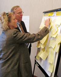 Board member Lisa Roday and Sam Jones, senior vice president for finance and administration, participate in the forum. (Photo by Brian Whitson)