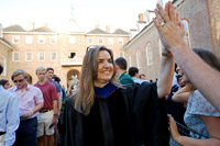 Provost Agouris nets high-fives in her first Convocation walk