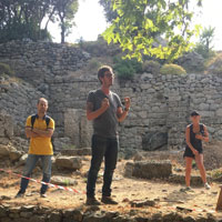 Andrew Ward speaks to a small group at the dig (Courtesy photo)