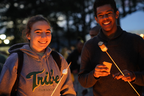 Students enjoy s'mores at the block party. (Photo by Stephen Salpukas)